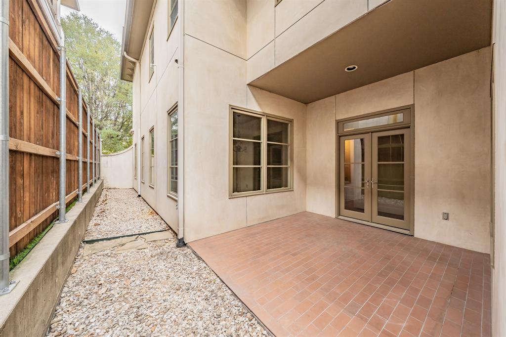 3635 Crestline Road Fort Worth, TX 76107 - Photo 39 of 40 a view of a large white house with a large window