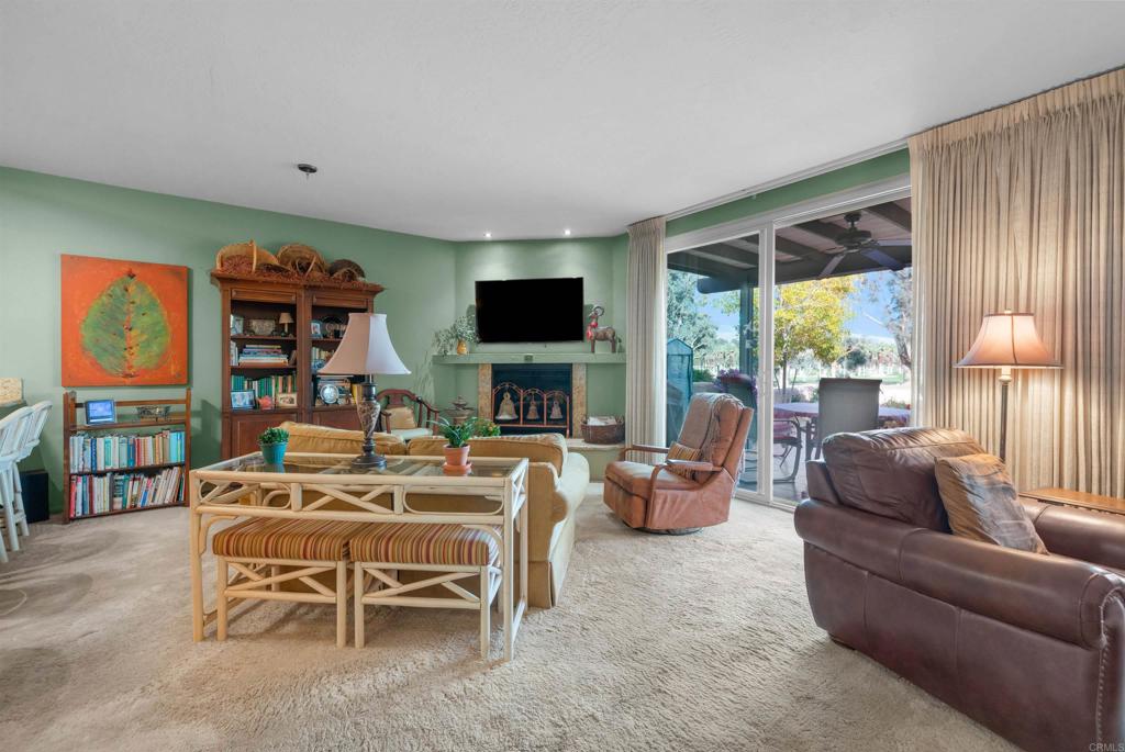 202 Pointing Rock Drive, Unit 6 Borrego Springs, CA 92004 - Photo 11 of 28 a living room with furniture fireplace and flat screen tv