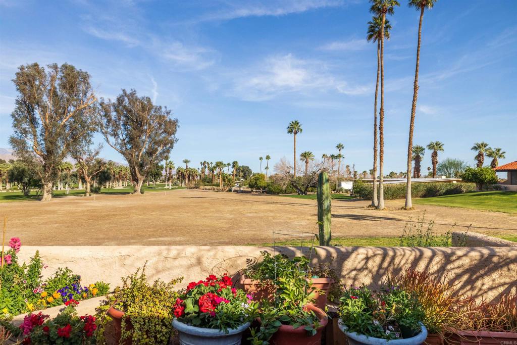 202 Pointing Rock Drive, Unit 6 Borrego Springs, CA 92004 - Photo 7 of 28 a view of a lake with a sitting area
