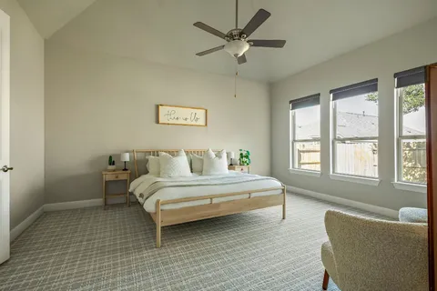 a kitchen with kitchen island granite countertop counter top space and refrigerator