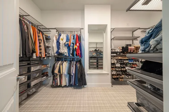 a view of a bathroom from a hallway