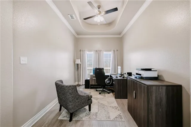 a view of a workspace with furniture