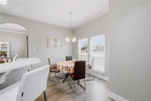 a view of a livingroom with furniture and a window
