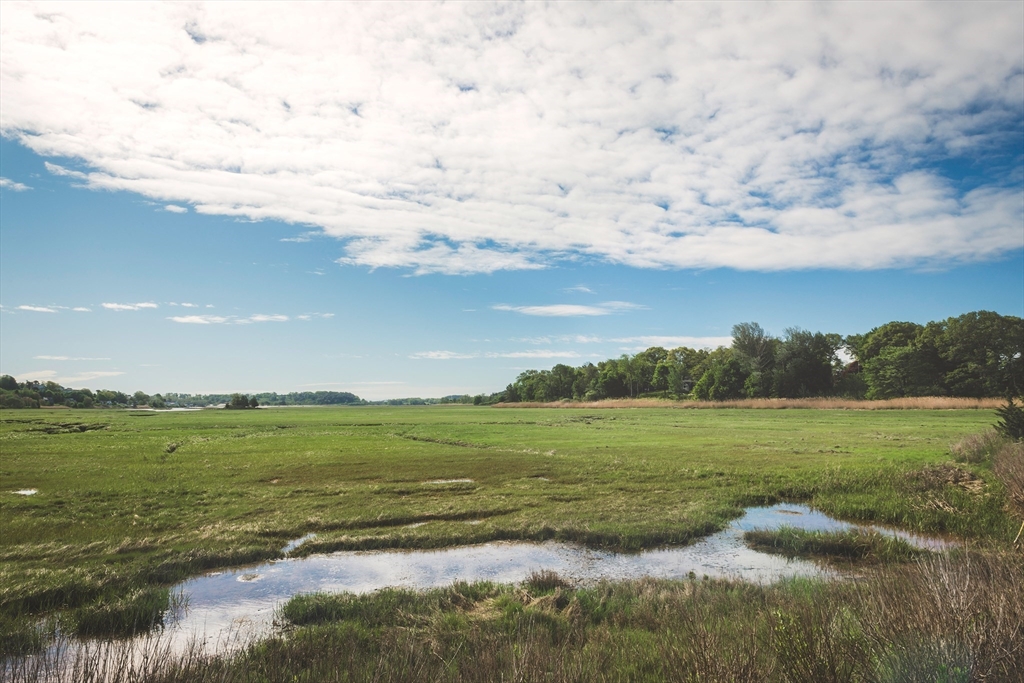 24 Island Park Road Ipswich, MA 01938 - Photo 14 of 25 a view of an ocean and beach
