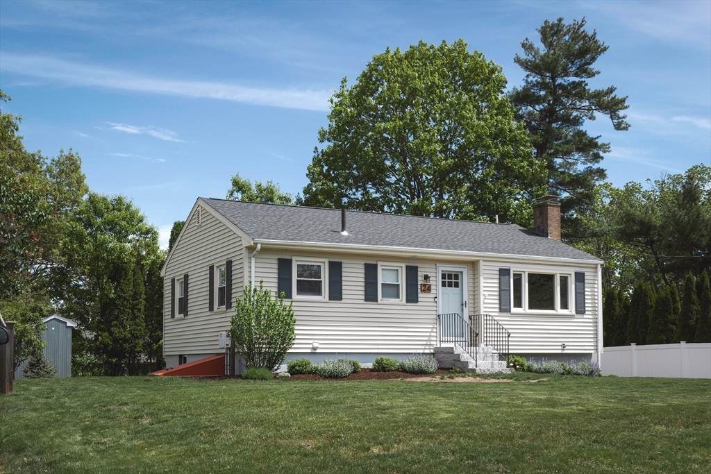 24 Island Park Road Ipswich, MA 01938 - Photo 17 of 25 a front view of a house with a garden