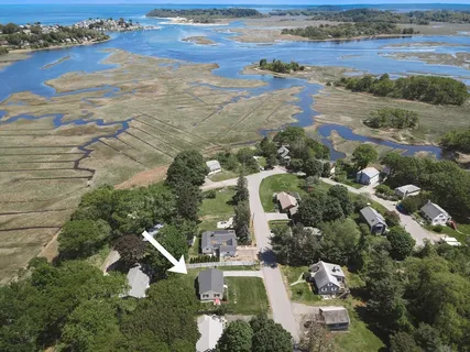 a view of an ocean and city