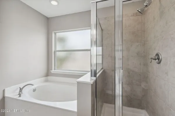 a bathroom with a bathtub