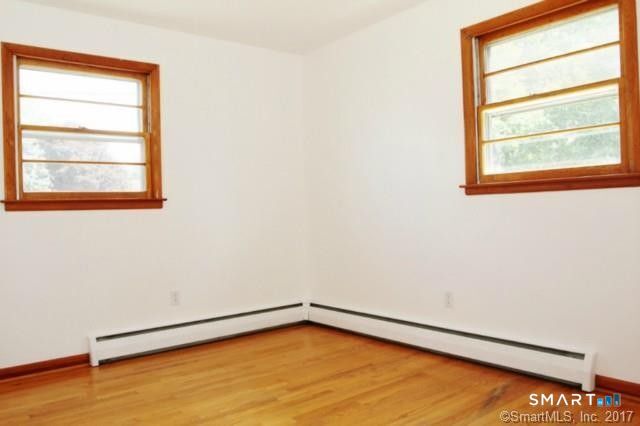 101 Waller Road Bridgeport, CT 06606 - Photo 5 of 10 an empty room with a window