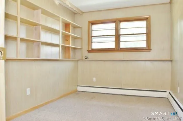 a view of a small space with a window