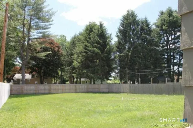 a view of swimming pool with trees