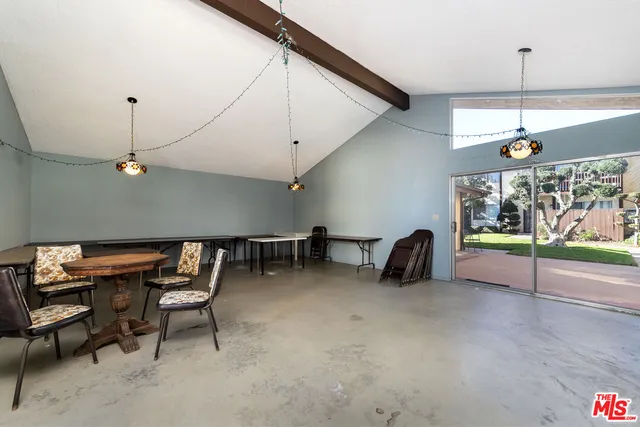 a room with furniture and a chandelier