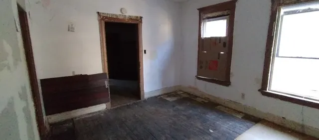 an empty room with windows