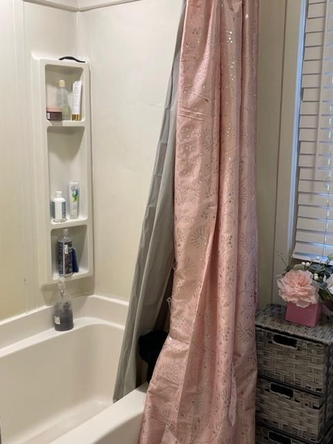 1765 Hall Spencer Road Edgemoor, SC 29712 - Photo 1 of 24 a bathroom with a bathtub and a sink