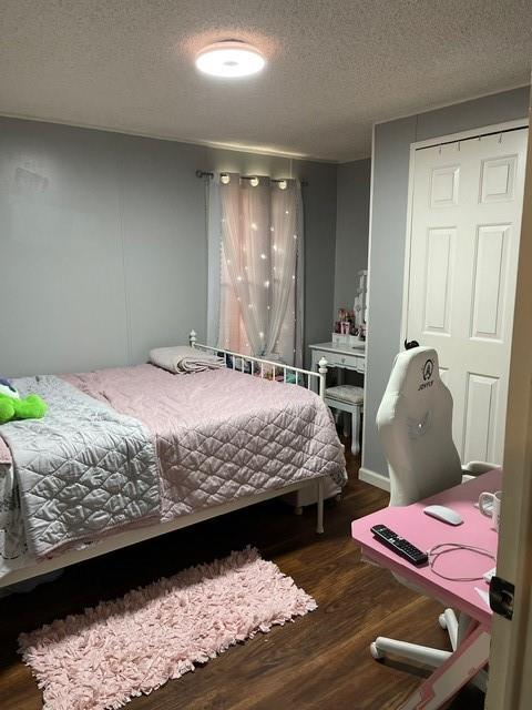 1765 Hall Spencer Road Edgemoor, SC 29712 - Photo 17 of 24 a bedroom with a bed and wooden floor