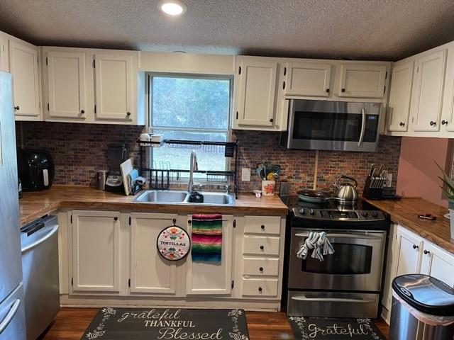 1765 Hall Spencer Road Edgemoor, SC 29712 - Photo 8 of 24 a kitchen with stainless steel appliances granite countertop a stove and a microwave