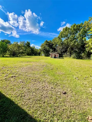 a view of an ocean from a yard