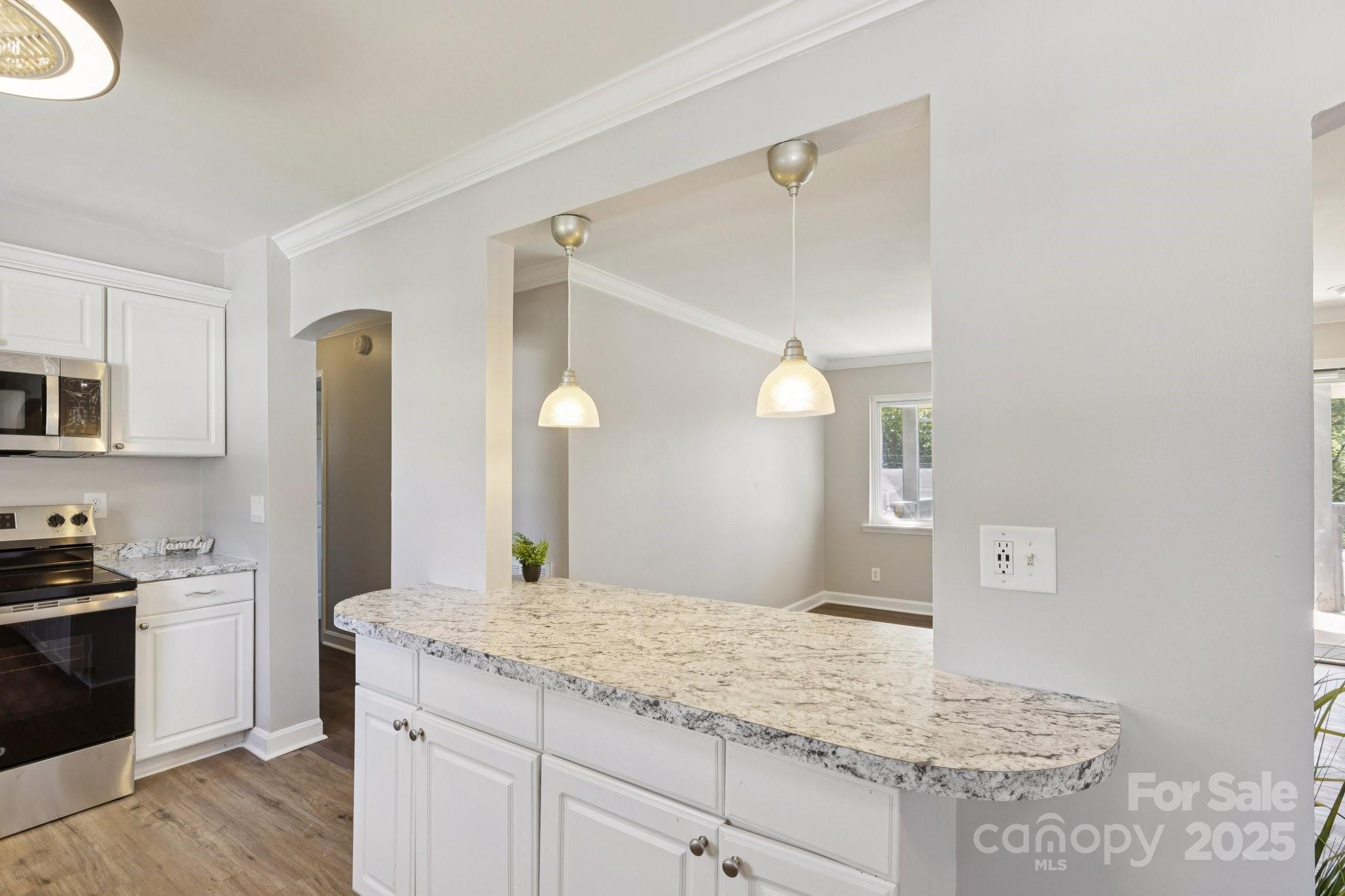 1024 Old Mountain View Road Mount Holly, NC 28120 - Photo 16 of 41 a bathroom with a granite countertop sink and a mirror