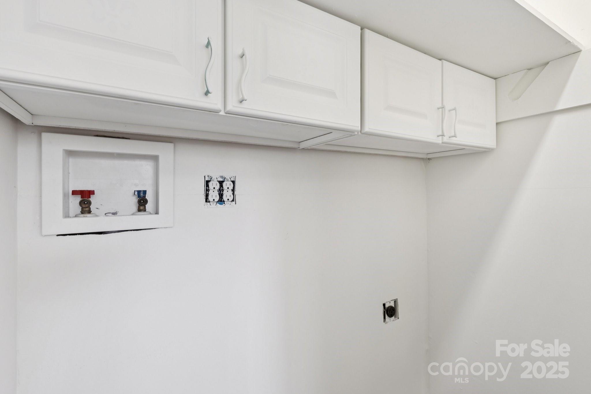 1024 Old Mountain View Road Mount Holly, NC 28120 - Photo 27 of 41 a view of white cabinets