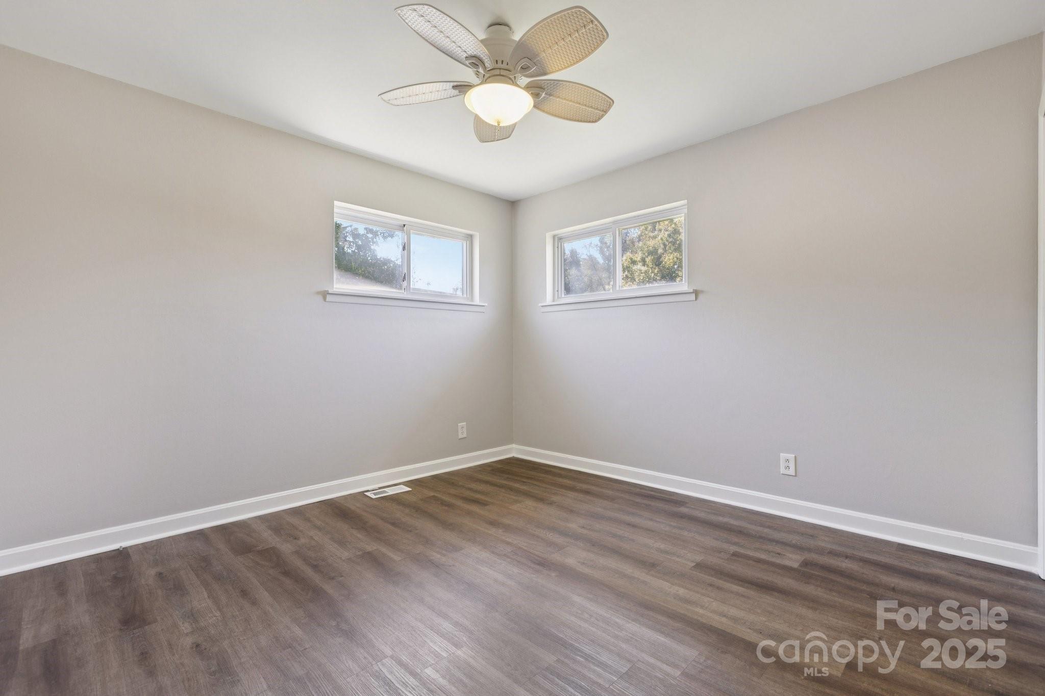 1024 Old Mountain View Road Mount Holly, NC 28120 - Photo 28 of 41 a view of an empty room with wooden floor
