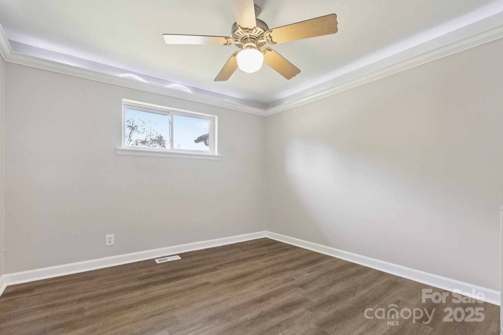 1024 Old Mountain View Road Mount Holly, NC 28120 - Photo 30 of 41 a view of an empty room with wooden floor