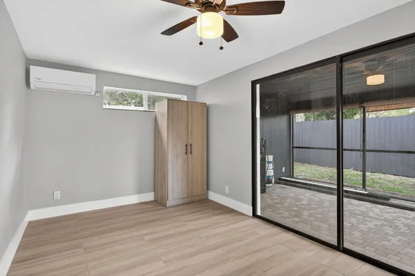 a view of an empty room with a window