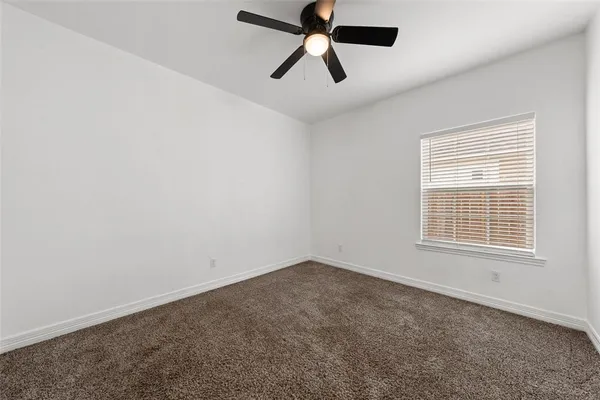 a bathroom with a sink a shower and a mirror