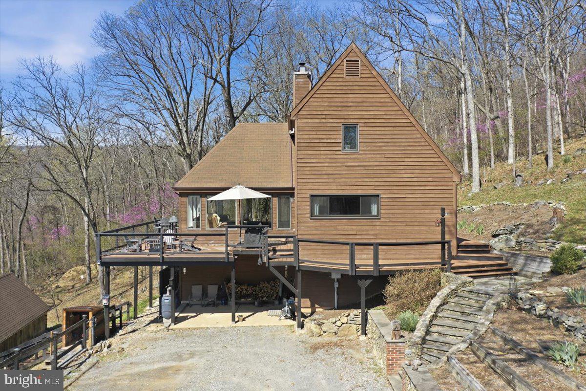 19897 Foresthill Road Bluemont, VA 20135 - Photo 4 of 39 a view of a house with sitting area