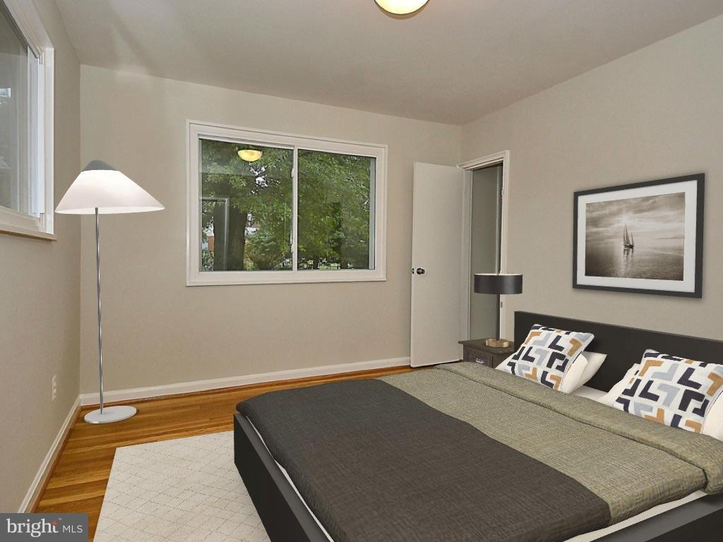 3300 Kayson Street Silver Spring, MD 20906 - Photo 14 of 27 a bedroom with a bed and a window