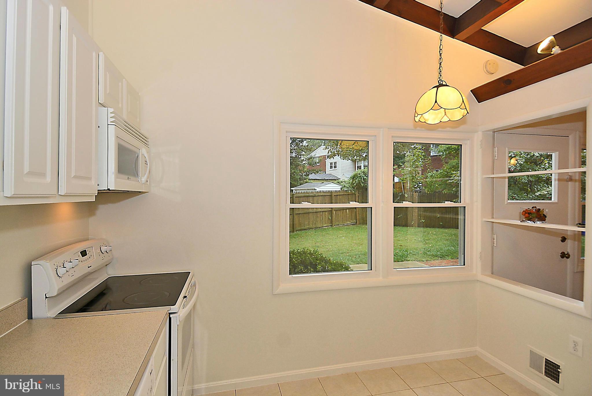 3300 Kayson Street Silver Spring, MD 20906 - Photo 8 of 27 a room with cabinets and window
