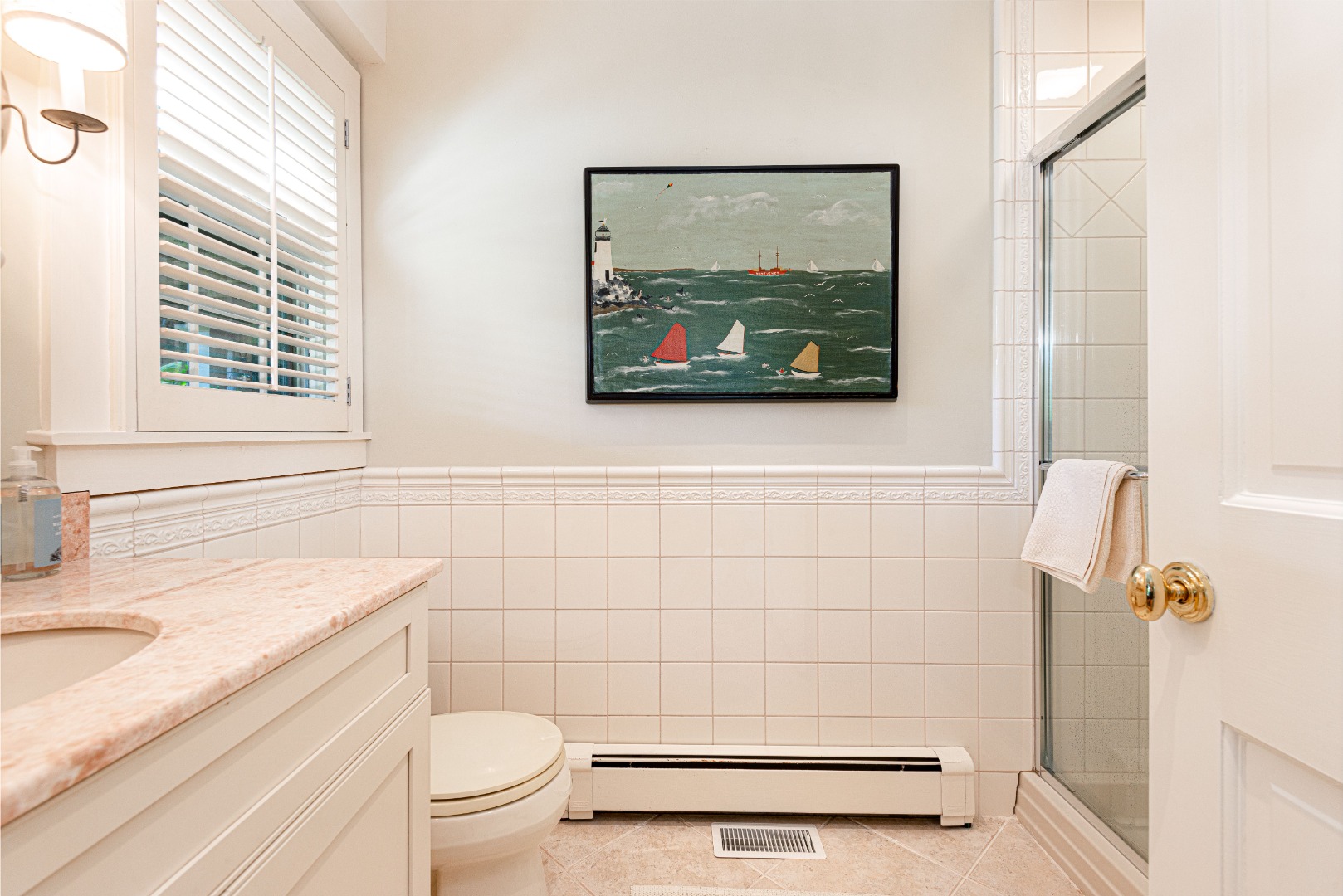 26 Pocomo Road Nantucket, MA 02554 - Photo 15 of 43 a bathroom with a granite countertop toilet a sink and a shower