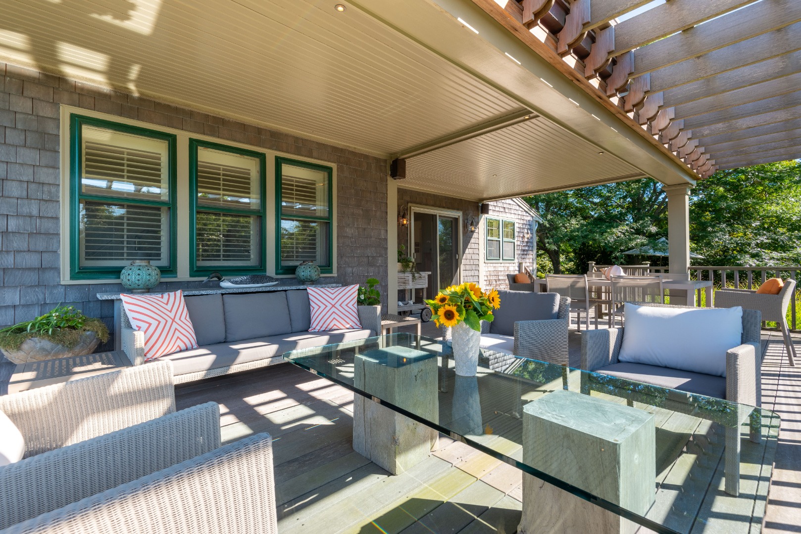 26 Pocomo Road Nantucket, MA 02554 - Photo 28 of 43 a outdoor living space with furniture and garden view
