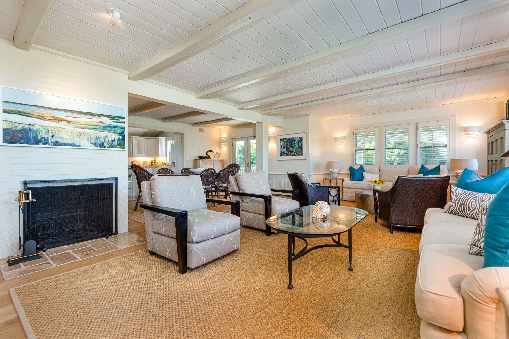 26 Pocomo Road Nantucket, MA 02554 - Photo 3 of 43 a living room with furniture and a fireplace