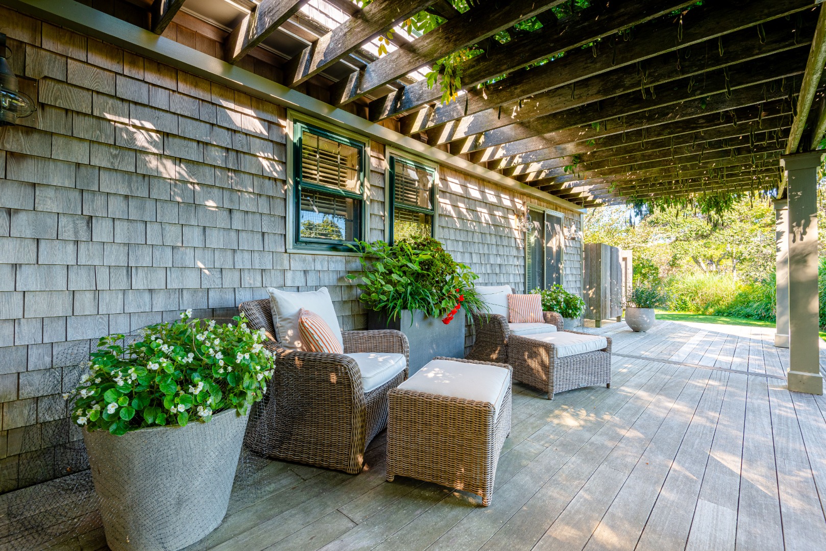 26 Pocomo Road Nantucket, MA 02554 - Photo 31 of 43 a building outdoor space with patio furniture and potted plants