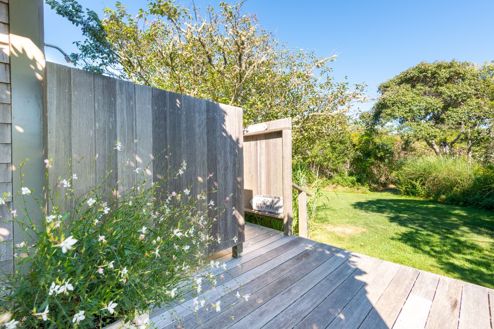 26 Pocomo Road Nantucket, MA 02554 - Photo 33 of 43 a view of a backyard with pathway
