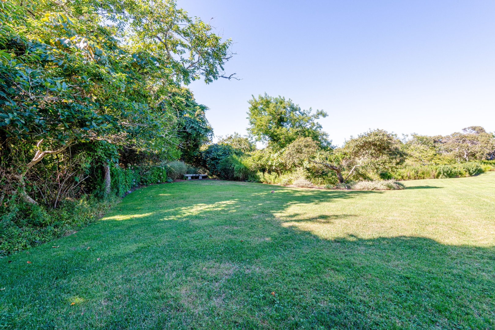 26 Pocomo Road Nantucket, MA 02554 - Photo 36 of 43 a view of an ocean from a yard