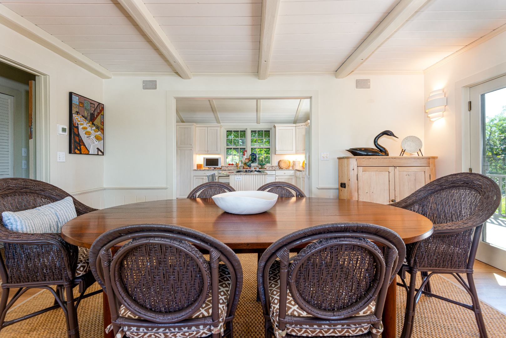 26 Pocomo Road Nantucket, MA 02554 - Photo 8 of 43 a view of a dining room with furniture and a window