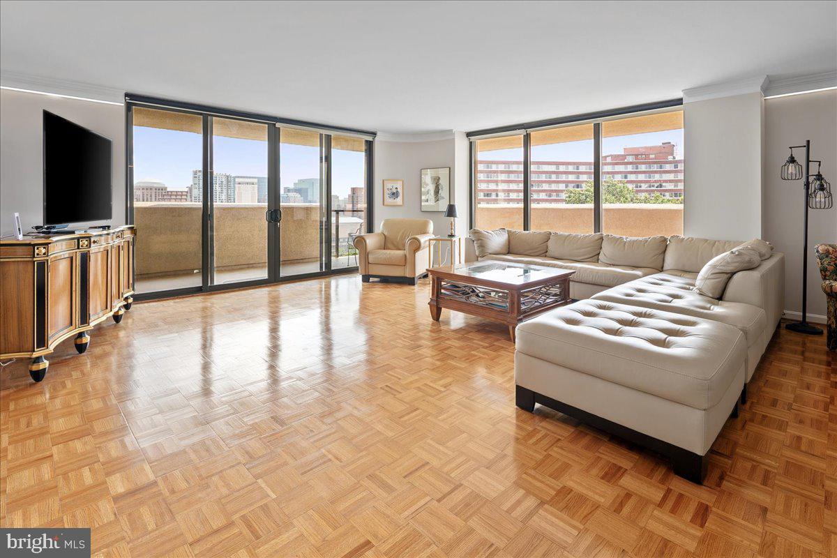 1101 South Arlington Ridge Road, Unit 402 Arlington, VA 22202 - Photo 2 of 61 Spacious living area with city views.