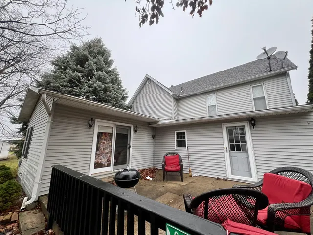 a view of outdoor sitting area with furniture