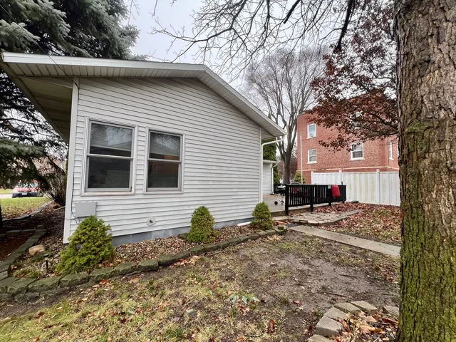 a backyard of a house with seating space