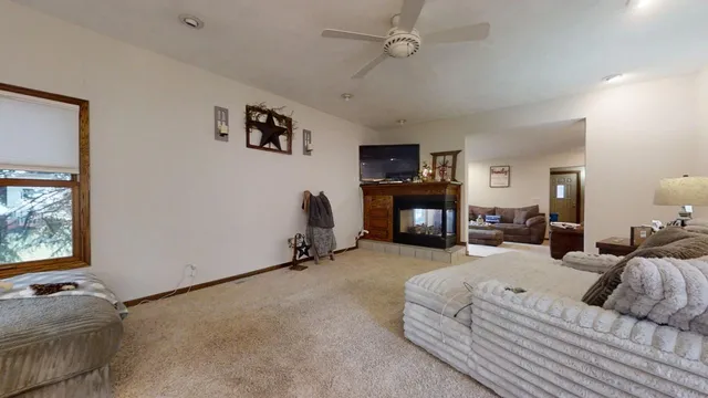 a bed room with bed and a window