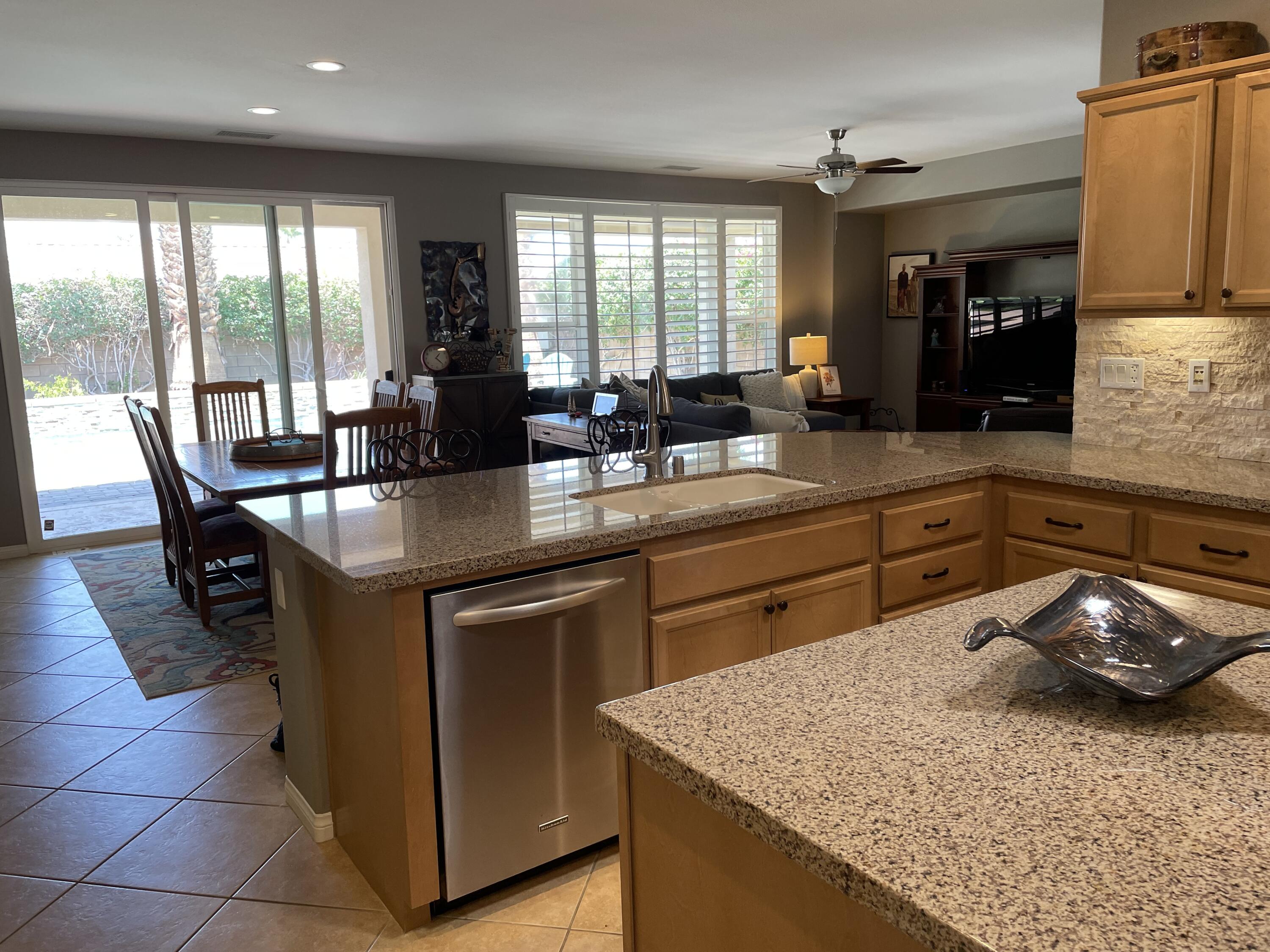 60880 Azul Court La Quinta, CA 92253 - Photo 12 of 33 a kitchen with a sink and large window