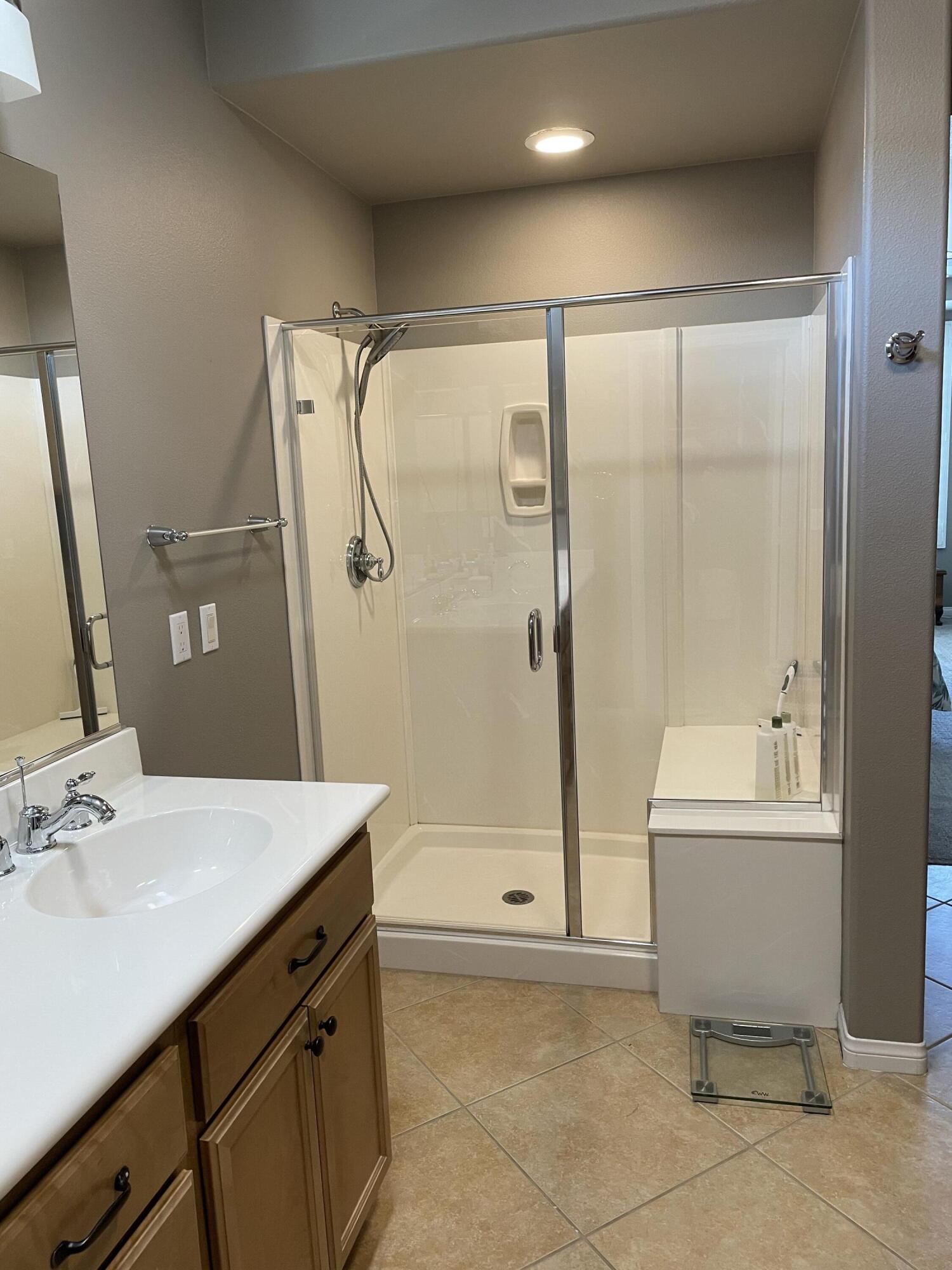 60880 Azul Court La Quinta, CA 92253 - Photo 18 of 33 a bathroom with a bathtub shower sink and toilet