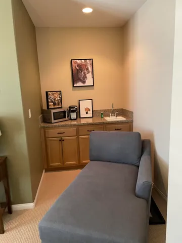 a bedroom with a bed and furniture