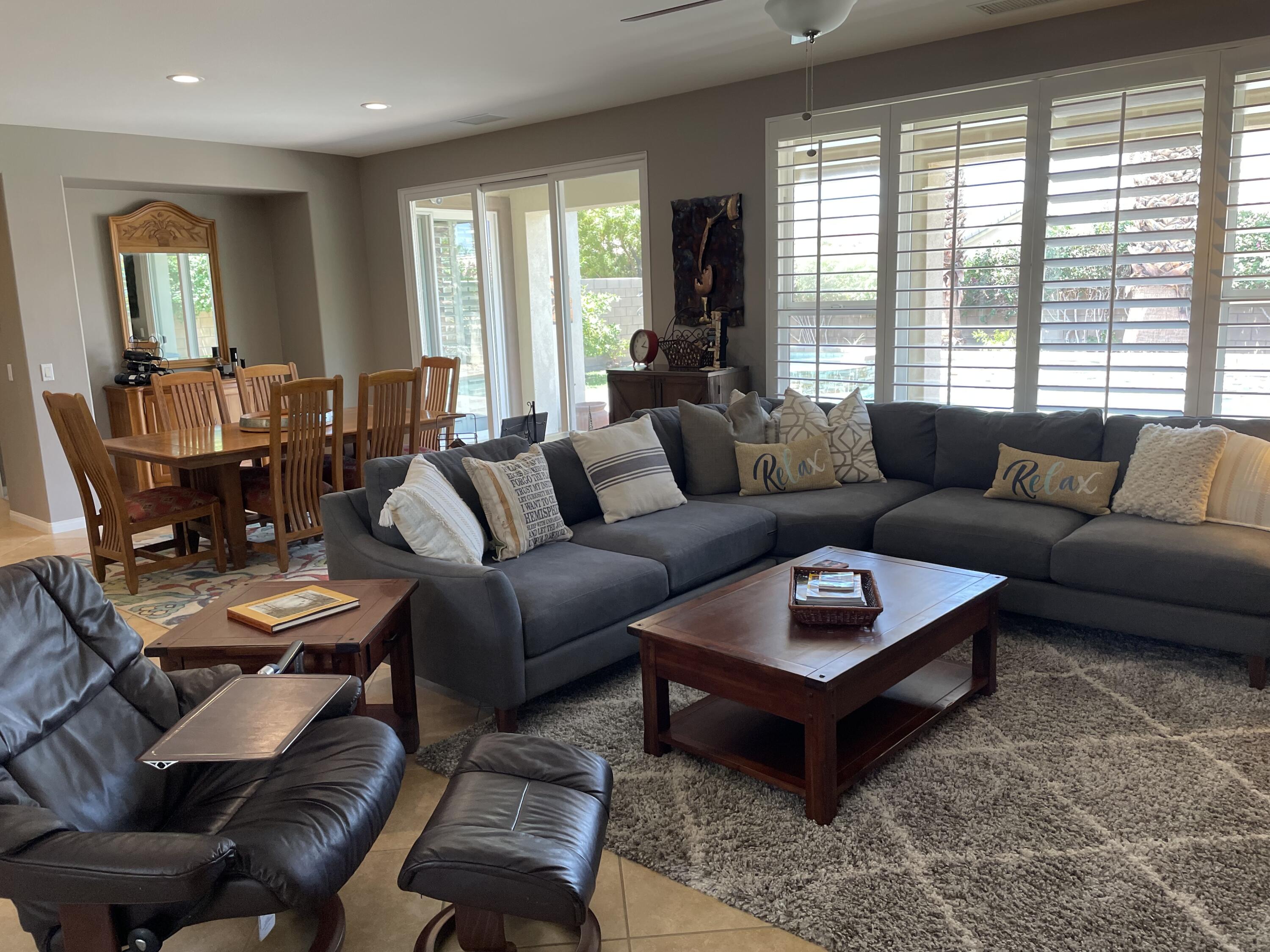 60880 Azul Court La Quinta, CA 92253 - Photo 6 of 33 a living room with furniture and a large window