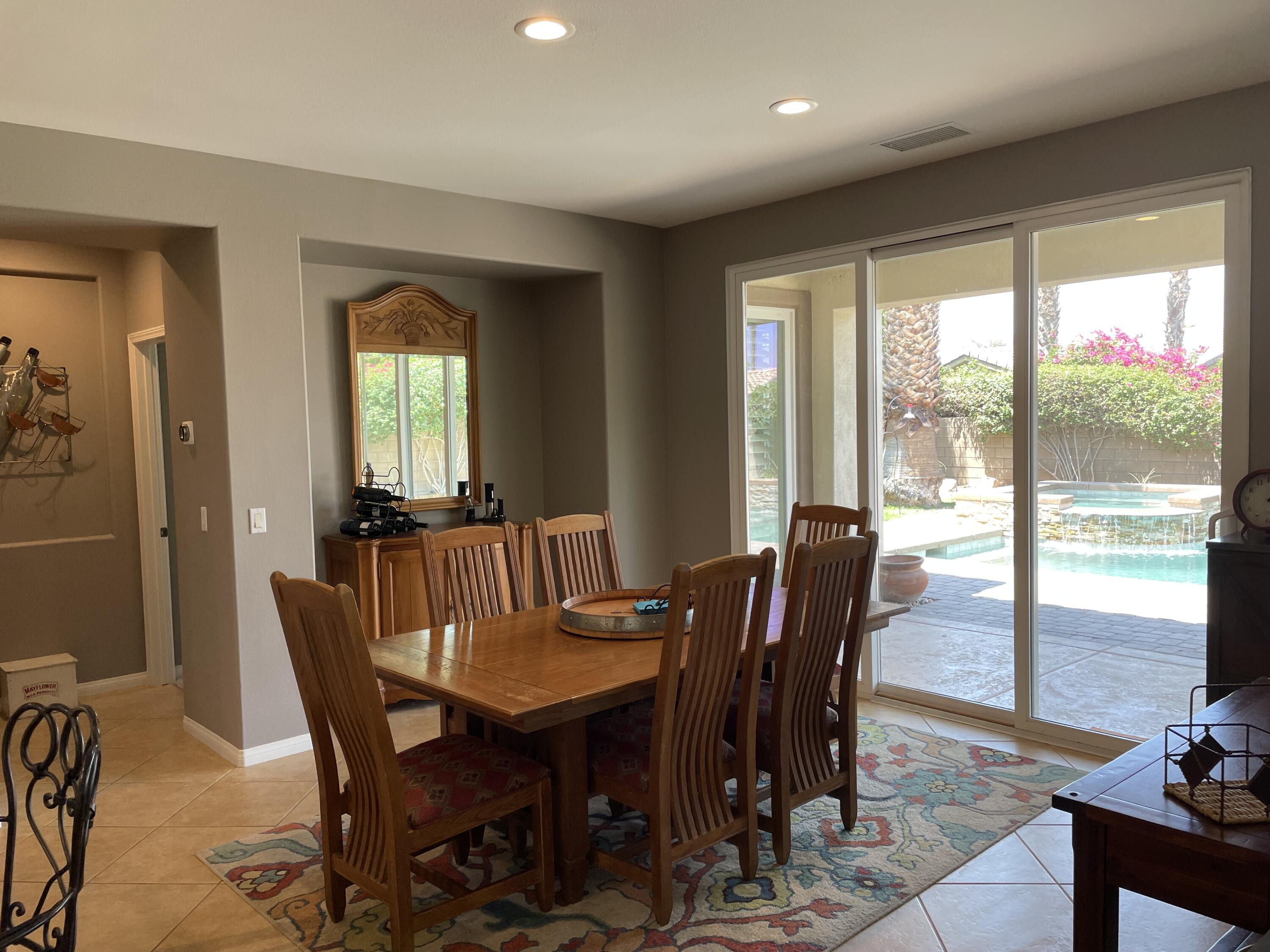 60880 Azul Court La Quinta, CA 92253 - Photo 7 of 33 a view of a dining room with furniture window and outside view
