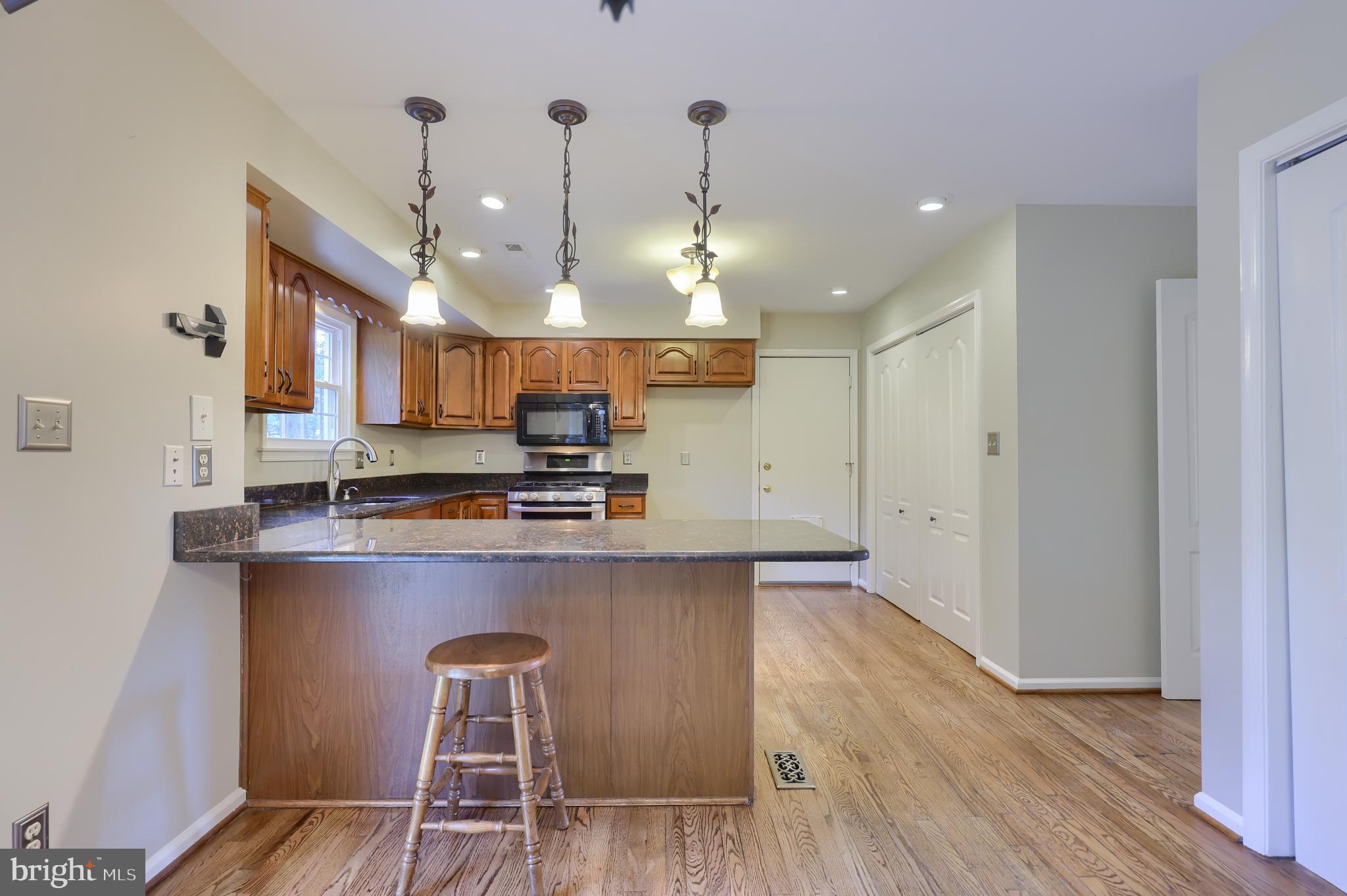 3645 Pleasant Valley Road York, PA 17406 - Photo 15 of 39 Kitchen w/ Granite Counters & Bar Seating