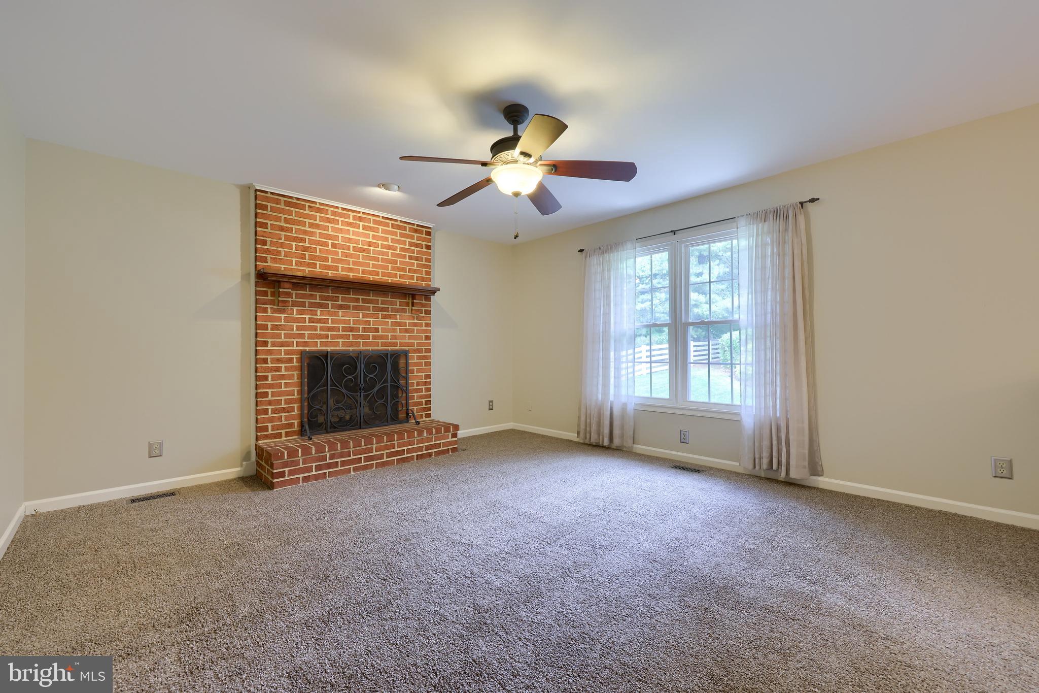 3645 Pleasant Valley Road York, PA 17406 - Photo 23 of 39 Family Room w/ Gas Fireplace