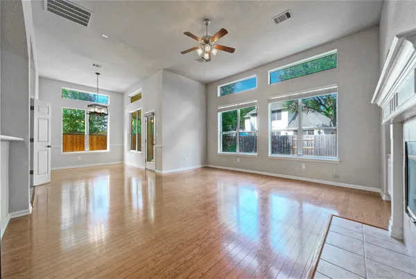 a view of an entryway with wooden floor