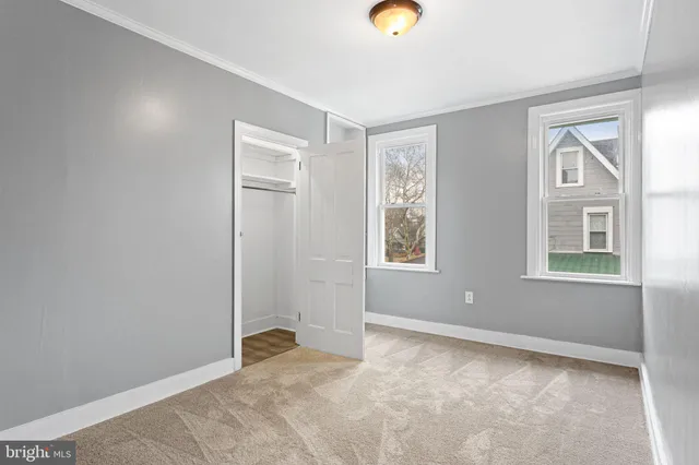 an empty room with windows