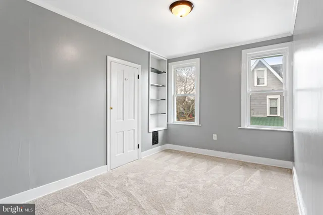 an empty room with windows